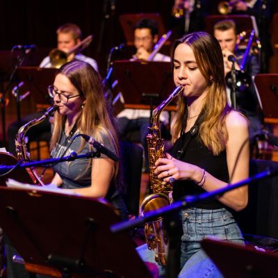 Guildhall saxophonists performing in a big band rehearsal